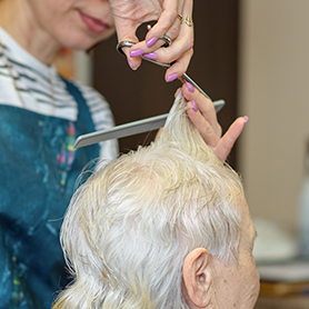 Resident having a haircut