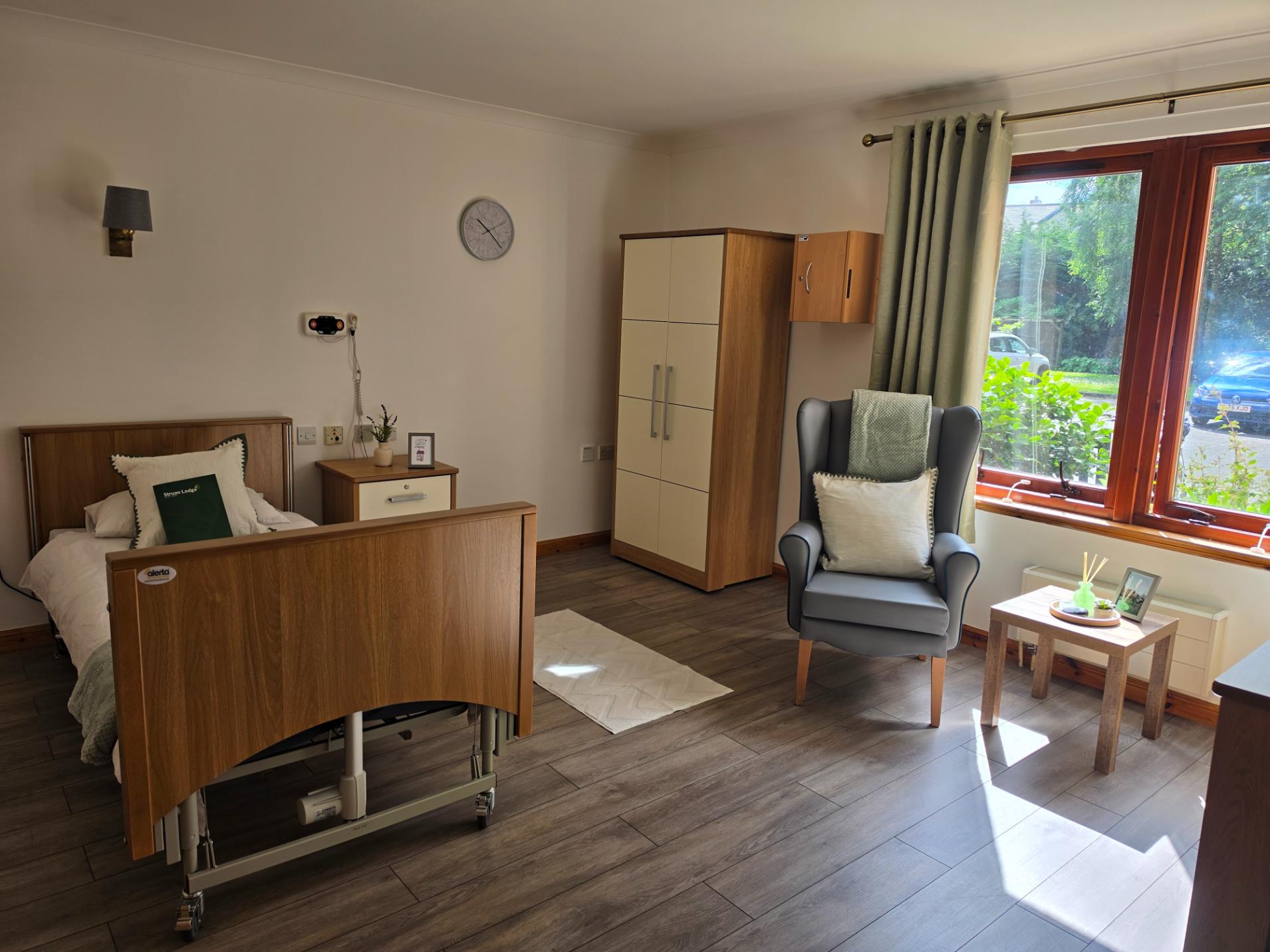 large, cosy care home bedroom