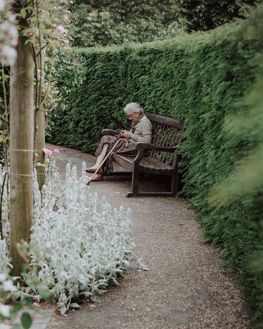 A resident reading in the garden
