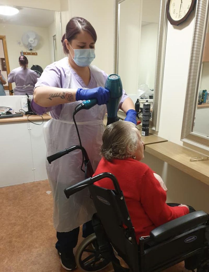 Resident Getting Her Hair Done