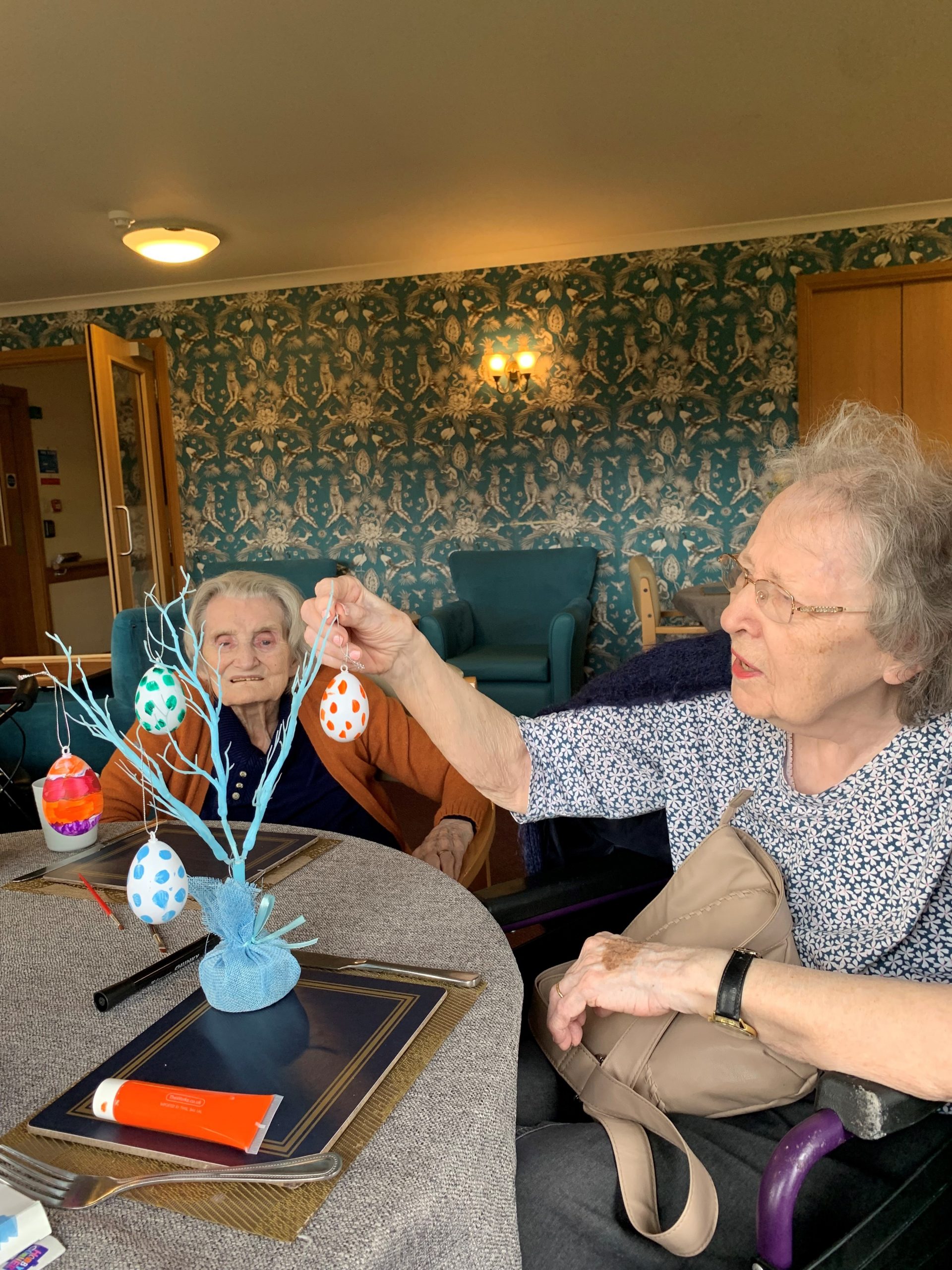 Residents Decorating Easter Tree