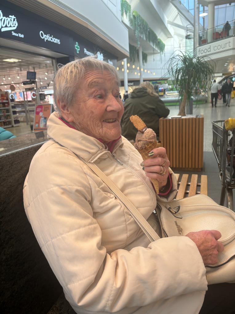 Resident eating an ice cream
