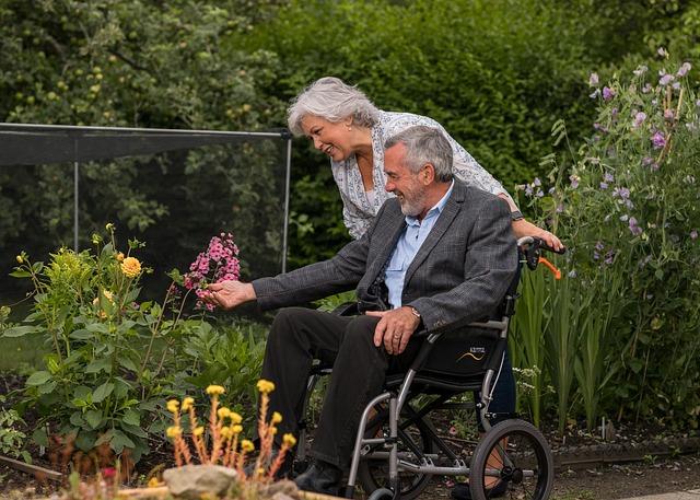 elderly man and woman in care home garden