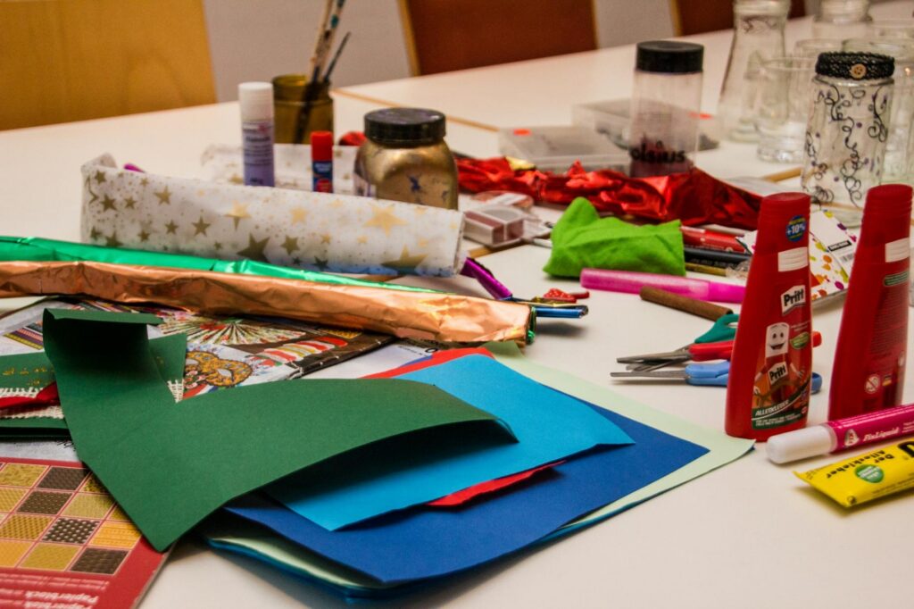 christmas craft supplies spread across as table